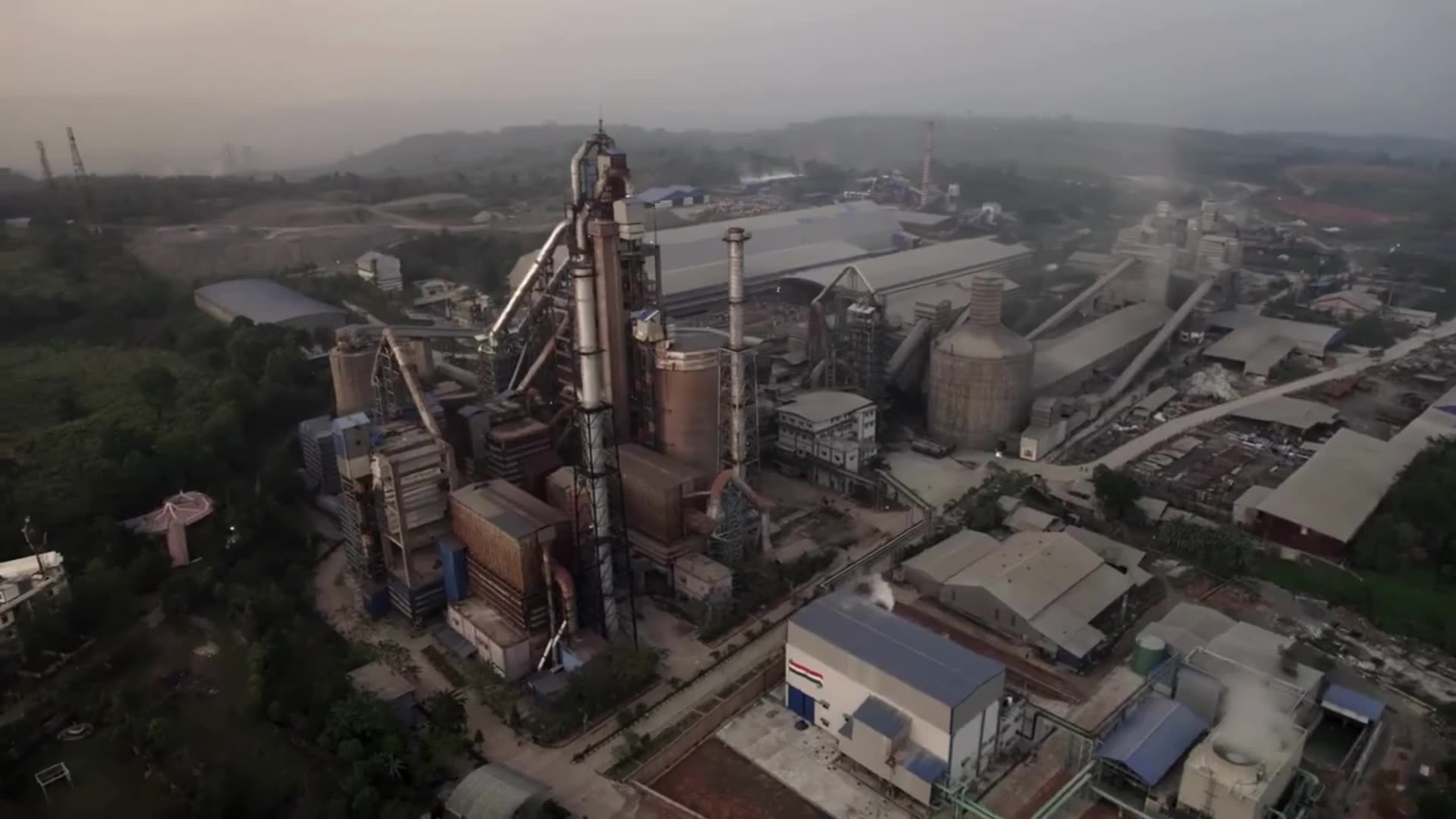 Aerial view of a cement manufacturing plant and its surrounding works